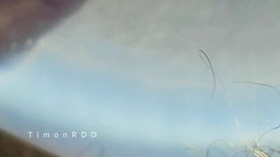 The guy cums in a condom with hot water with powerful volleys