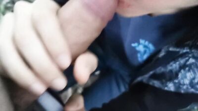 Twink gets a blowjob outdoors