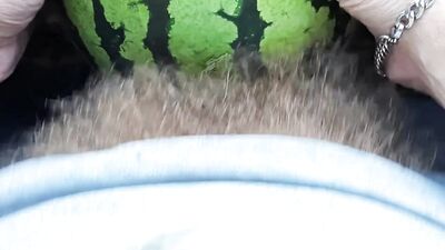 The guy fucks watermelon hard with a big hairy dick