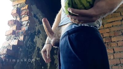 The guy fucks watermelon hard with a big hairy dick