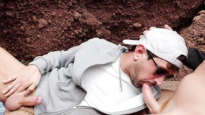 Sucking my red husband on the beach