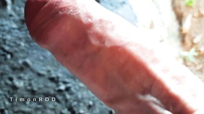 Neanderthal man masturbates dick in a cave near a campfire