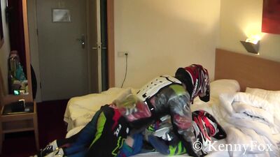 Ficht in motocross gear over who is going to be the bottom