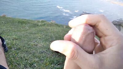 Huge Dirty Cock Gets Handjob In Public And Squirts A Lot Of Thick Sperm In Front Of The Beach