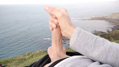Huge Dirty Cock Gets Handjob In Public And Squirts A Lot Of Thick Sperm In Front Of The Beach
