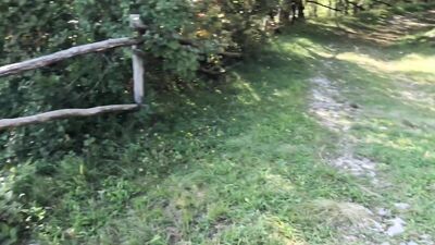 Cute twink boy enjoys the sunset in the mountains