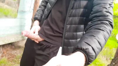 The guy pisses powerfully and then jerks off a cock at an abandoned recreat