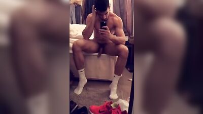 Mirror, Mirror on the Wall: A Muscular Man Strips Bare and Poses for All to See