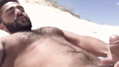 Bold Arabic Stallion Pleasures Himself on the Beach and Cums
