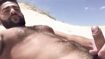 Bold Arabic Stallion Pleasures Himself on the Beach and Cums