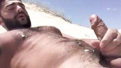 Bold Arabic Stallion Pleasures Himself on the Beach and Cums