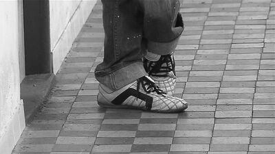 Gay Porn: A Young Student Gets Banged in the Bathroom by his Friends, Wearing a Raincoat - Tagged as Ejaculation, Handjob, Raincoat.