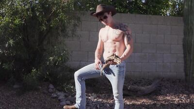 Surfing Australian with blue eyes shows his equipment