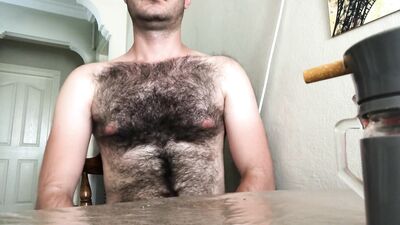 Very hairy solo man cum on kitchen table while smoking and tea