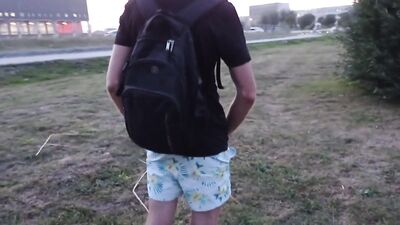 handsome jerking off a dick on the embankment of the plant. EXTREME