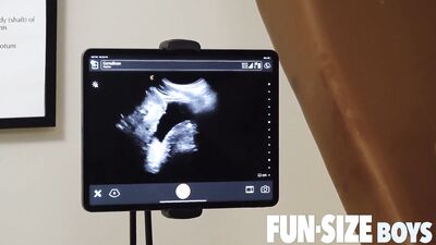 Hung doctor uses ultrasound to show his bare dick in boy
