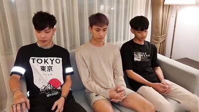 young and hungry asian men sucking and fucking in a triple blowjob with