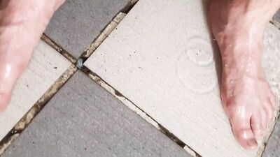 Guy fingering in the shower after work
