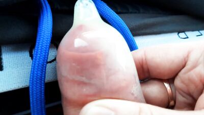 The guy filled the condom to the top with sperm while sitting in the car