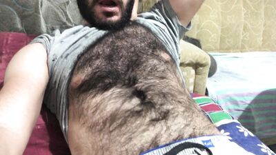 I'm getting ready to masturbate by stroking my hairy body
