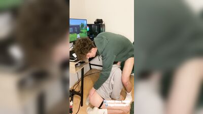 Stepbrother twink sucks my cock while I play a game and then takes out 10 inch monster cock
