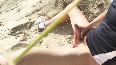 This teen hoping to pee on some other men instead of sand