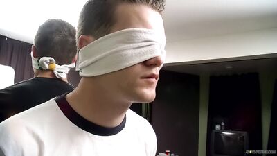 Cocksucker Bryce Corbin blindfolded and pissed on orgy