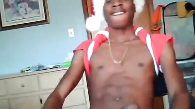 Merry Christmas, Gifts for the Guys!: A Black Gay Man Strips and Masturbates in His Christmas Suit; Filling It with Lots of Cum.