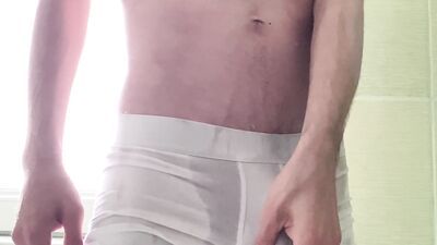 Cocky spies get caught in a steamy shower romp.