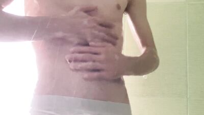 Cocky spies get caught in a steamy shower romp.