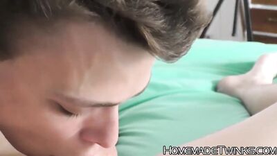 Doggy style fucking with two young twinks in the bedroom