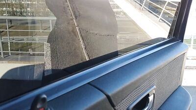 boy jerks off in a shopping mall parking lot