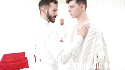 Two sexy young men perform a sacred sexual ceremony with a muscular older man wearing a suit, while paying tribute to ancient Greek gods.