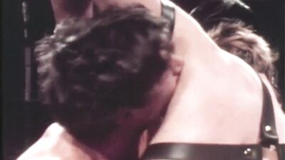 Rewritten as: "Leather-clad biker fucks sexy sailor jock in a hardcore porn video by Falcon Studios, starring Tim Kramer and Mac Turner."