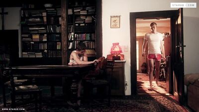 Leather-clad bros get it on in the garage, oil spurting everywhere.