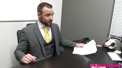 Male models in suits get fingered during a wild office party.