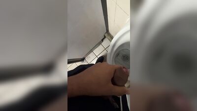 Male models get it on with each other while urinating in the restroom of a popular London hotspot.