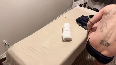 "Manual laborer receives the most thorough rubdown imaginable by an eager trainee."