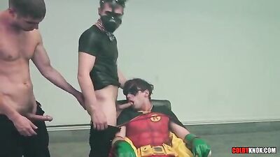 Batmans Gay Porn Parody: Robin Captured by Two Villains, Sucking Cocks and Asses
