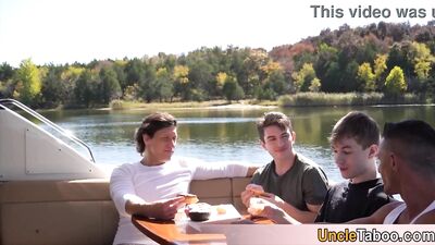 Two hot hunks chartered a yacht and rented out two horny youths for a wild time at sea.