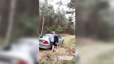 Young man sucks his step-brothers giant dick in the open air, while sitting on a car