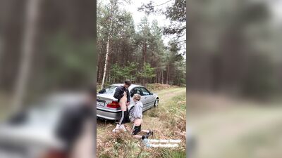 Young man sucks his step-brothers giant dick in the open air, while sitting on a car