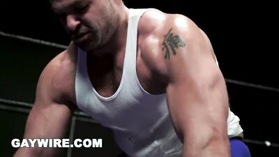 Gay Wrestling: Muscular Men in Oil-slicked Bodysuits Brawl