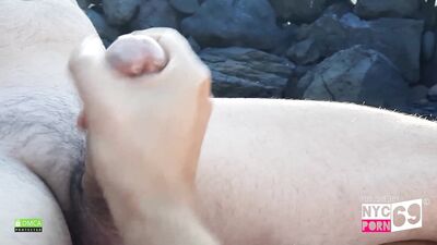 Jerking off on a nudist beach