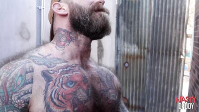 NASTYDADDY Hairy DILF Jack Dixon gives a hot blowjob to sexy stud Ryan Carter