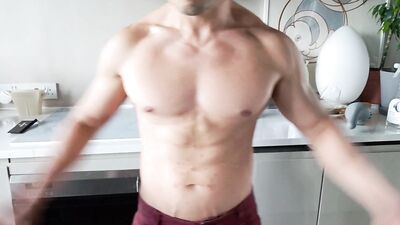 Straining in his clothes, he rips off his shirt and pants revealing a rock hard bod With one finger, he commands his wife to lick up his hot load