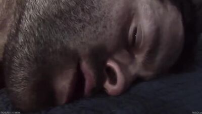 Two very alternative guys engage in a blowjob session.