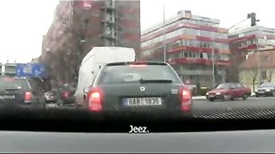 He is being sucked off by a straight guy in the car.