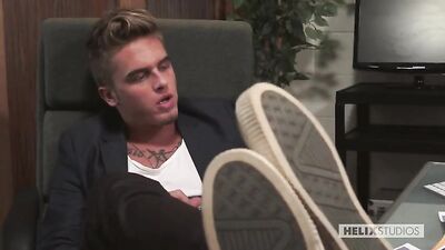 Gay male interns introduced to anal sex by their supervisor.