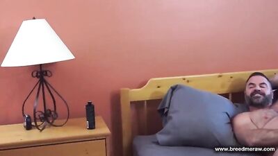 The guy is going to get assfucked by a muscular bear.